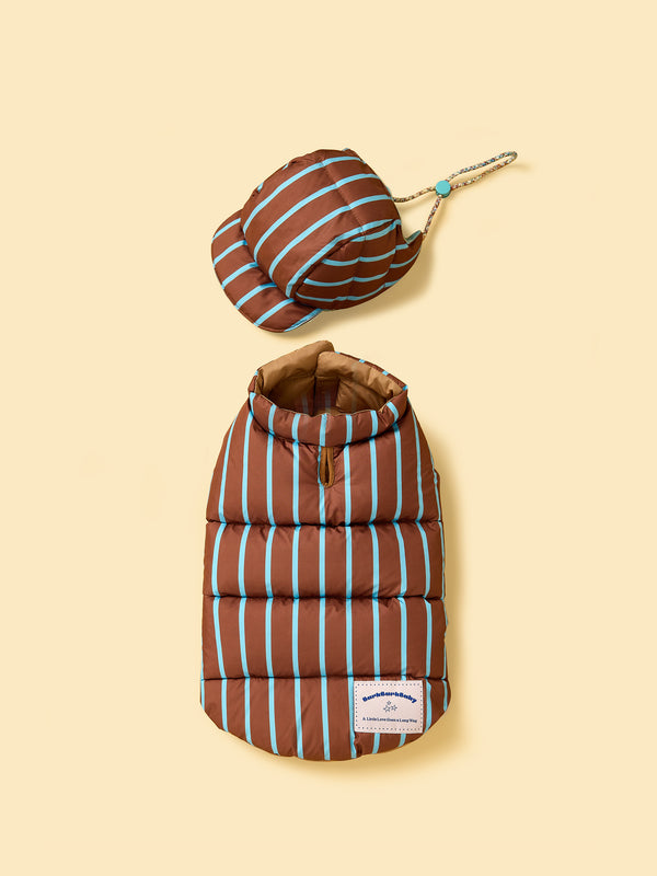 Brown and blue striped pet puffer coat with matching hat on a beige background